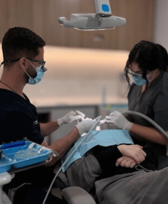 oatley dental team with patient at ICS Dental Studio