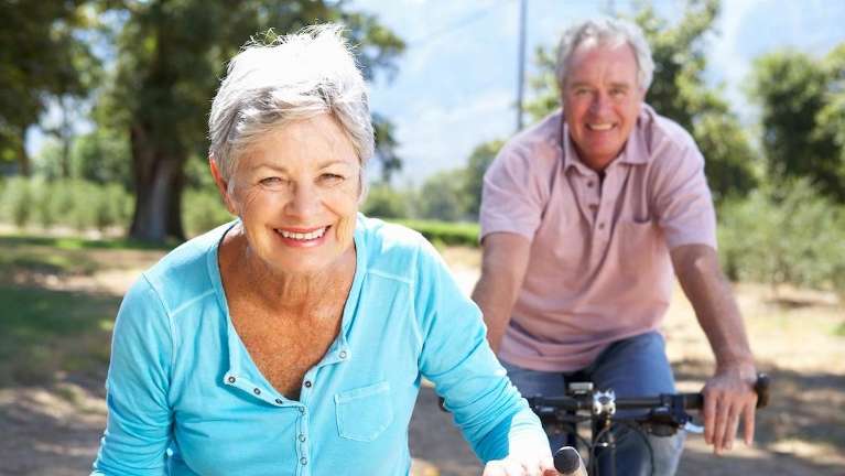 couple riding bikes in picnic point