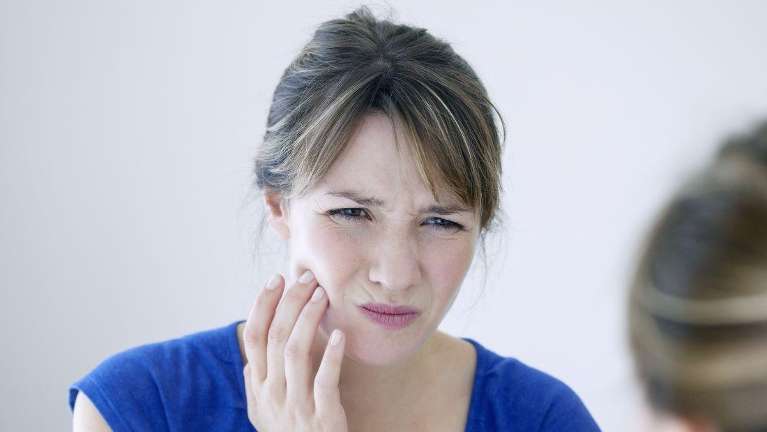 Emergency Dentistry Panania | woman with toothache