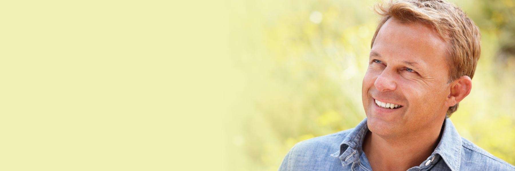 man with dental implants in East Hills